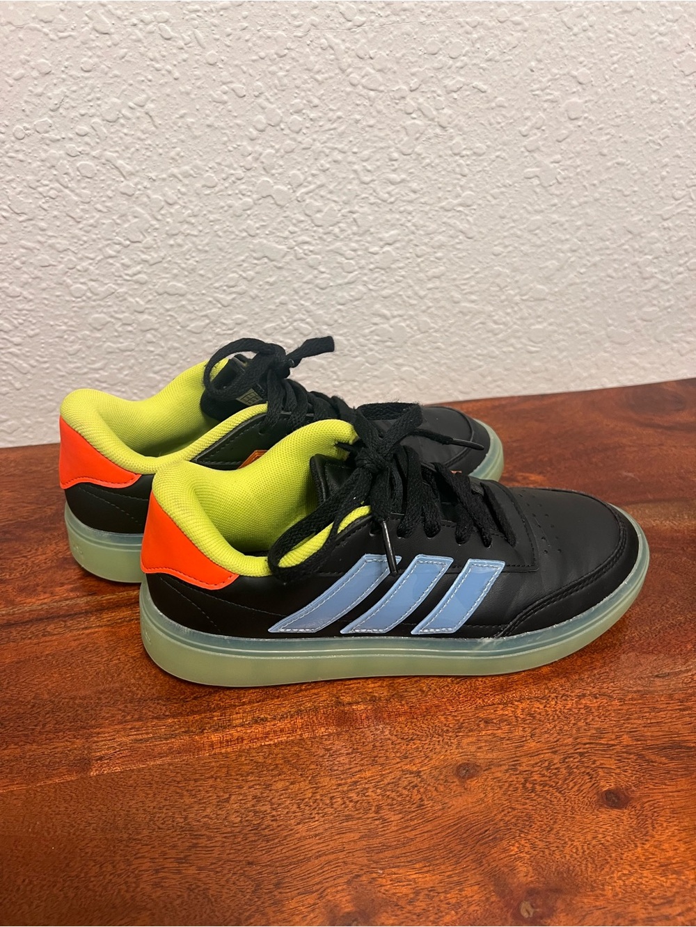 adidas Kids Black Sneakers with Light Blue Stripes and Neon Yellow Accents